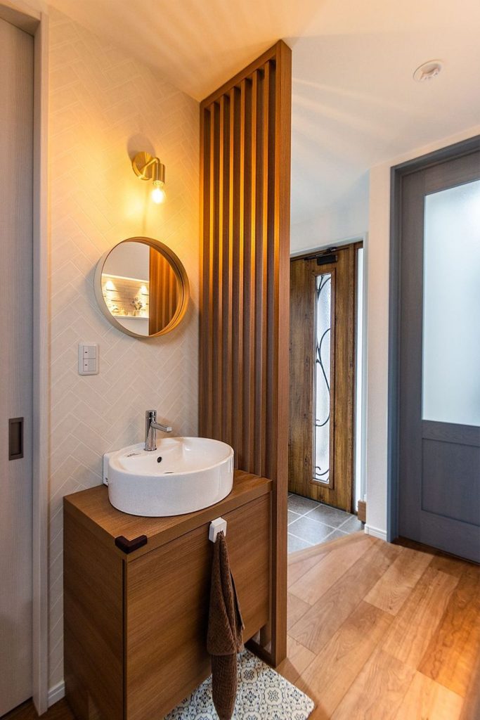 Washbasin unit with slatted divider
